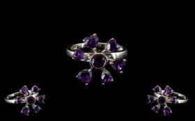 Amethyst Spinner Ring, an unusual ring, set with two sizes of heart cut amethysts,