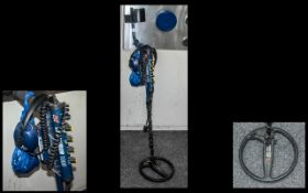 A Minelab Excalibur 1000 Metal Detector BBS technology with head phones.