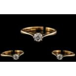 18ct Gold and Platinum Single Stone Diamond Ring. Marked 18ct and Platinum. .