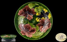 William Moorcroft Signed Large Footed Tube lined Footed Bowl ' Hibiscus ' Assorted Pattern on Green