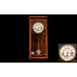 Mahogany Cased Wall Clock with pendulum.