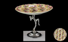 Art Deco Dancing Girl, Chrome comport with a chintz design pottery plate top. Circa 1930s.