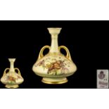 Royal Worcester - Hand Painted Twin Handle Blush Ivory Vase, Highlighted with Gold Handles and Base.