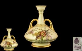 Royal Worcester - Hand Painted Twin Handle Blush Ivory Vase, Highlighted with Gold Handles and Base.