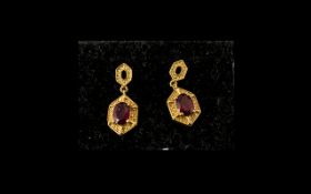 Ruby Geometric Drop Earrings, 2cts oval cut rubies, of a desirable rich red,