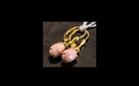 Pink Opal Drop Earrings, an oval cut cabochon of pink opal measuring 1ct to each drop, a total of