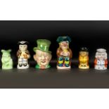 Collection of Six Toby Jugs, comprising: Beswick 'Title Deeds' marked 310 to base 9'' tall; Tony