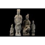 Terracotta Japanese Warriors, four in total, the largest being over 10 inches (25+cms); signed