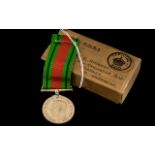 1939-1945 Defence Medal on ribbon, in original brown cardboard OHMS box addressed to Mr C Hardman,
