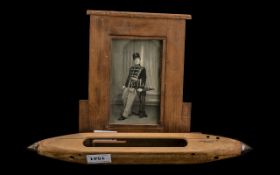 Wood Frame With The Photograph of a Hussar in full military dress, plus an antique shuttlecock (2)
