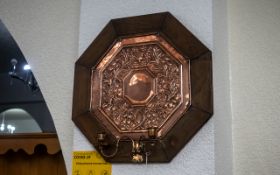 Keswick School of Industrial Art Beaten Copper Hexagonal Shaped Wall Sconce, with two candle arms.