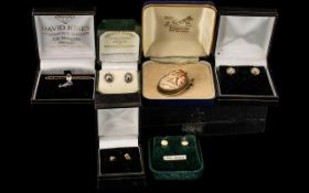 Small Collection of Mostly 9ct Gold Jewellery to include four pairs of stud earrings, a shell