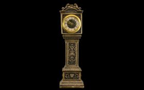 Novelty Miniature Grandfather Clock, In Green Man Style, Has Brass Face and Was Made In Germany,