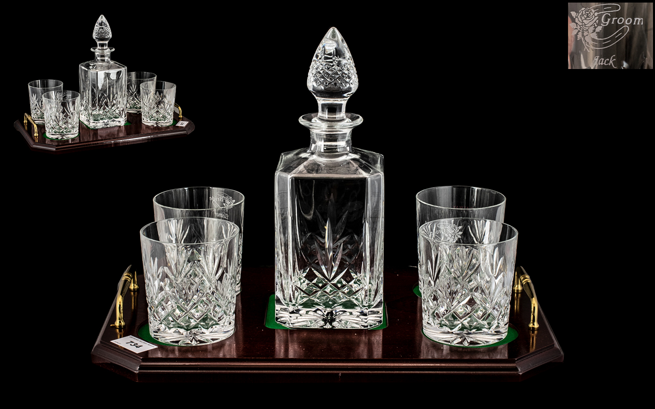 A Whisky Decanter and Four Tumblers housed on a twin handled tray with mahogany finish. Tray