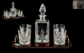 A Whisky Decanter and Four Tumblers housed on a twin handled tray with mahogany finish. Tray