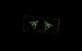 Russian Diopside Trefoil Stud Earrings, each earring comprising three pear cut Russian diopsides,