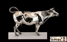 Dutch 19th Century Superb Quality Large Silver Creamer In The Form of a Cow with Ruby Eyes, of