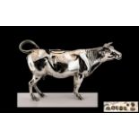 Dutch 19th Century Superb Quality Large Silver Creamer In The Form of a Cow with Ruby Eyes, of