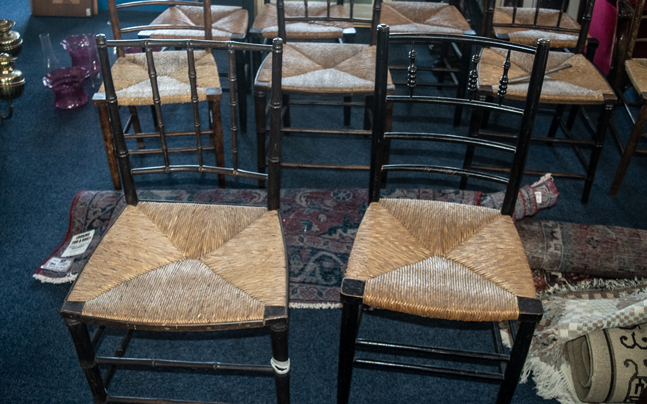 A Harlequin Set of 10 William Morris Suffolk Style Rush Seated Country Chairs, in stained beech. - Image 3 of 3