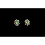 Colombian Emerald Halo Stud Earrings, oval cut emerald solitaires, mined in Colombia, the source