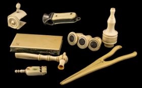 Collection of Antique Ivory to include glove stretchers, whistle, lace bobbins, card holder purse,