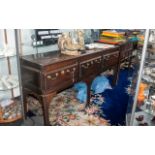 Queen Anne Period Low Dresser with brass drop handles and three drawers. Later replaced legs in need