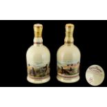 Two Famous Grouse Whisky Porcelain Collectible Bottles. Two bottles of Famous Grouse housed within a