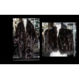 Dark Brown Fur Coat with collar and reveres, two slit pockets, fully lined in patterned sateen, hook