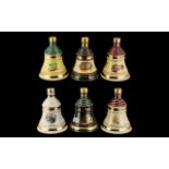 Bells Whisky Collectible Bottles Christmas Series, comprising Christmas 1991, 1994, 1996, 1997 and