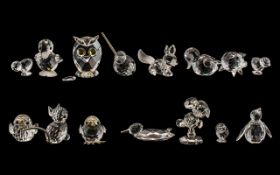 Collection of Swarovski Crystal Miniature Figures, comprising an owl with jewelled eyes; a family of