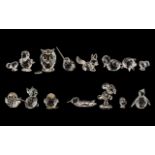 Collection of Swarovski Crystal Miniature Figures, comprising an owl with jewelled eyes; a family of