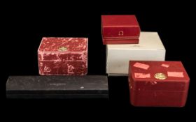 Three Vintage Omega Watch Boxes & A Longines Watch Box. Comprises: a red Omega box with gold Omega