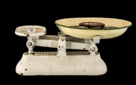 Set of Vintage Metal Domestic Scales with assorted weights.