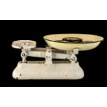 Set of Vintage Metal Domestic Scales with assorted weights.