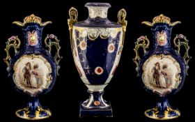 A Set of Three Staffordshire Vases, of shaped form, depicting courting scenes on blue ground, as