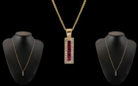 Ladies 9ct Gold Attractive Diamond and Ruby Set Oblong Shaped Pendant - Attached to a 9ct Gold