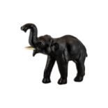 1940s/50s Leather Elephant in the Dimitri Omersa Style, the elephant with raised trunk, a pose