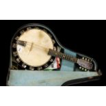 British Made 8 String Banjo / Mandolin Stamped H5 in a mahogany stained frame, in original black