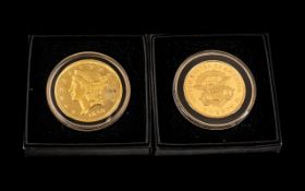 Two Twenty Dollar USA 24 Carat Plated Coins, each boxed (2)