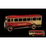 Early 20th Century Chad Valley Tinplate Bus, a wind-up tinplate bus in original Chad Valley paint;