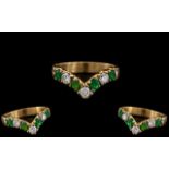 18ct Gold - Attractive Diamond and Emerald Set Wishbone of Superb Quality. The Diamonds and Emeralds