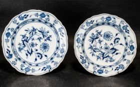 Pair of Meissen Onion Pattern Plates with underglaze blue crossed swords marks; each 8 inches (