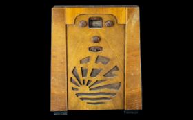 Art Deco Walnut Radio, Square Tapered Form, Sunburst Fretwork Speaker, Unmarked. Height 20 Inches
