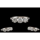 Platinum - Superb Quality 3 Stone Diamond Set Ring of Excellent Sparkle. The Modern Round