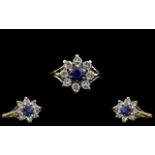 Ladies - Attractive 18ct Gold Diamond and Sapphire Set Cluster Ring - Flower head Setting. The