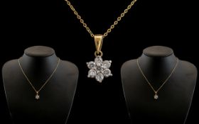 9ct Gold Chain and Pendant, a white stone flower design pendant in 9ct gold, with attached 9ct