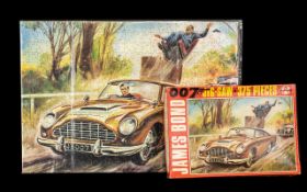 James Bond Jigsaw 1960's ' Gold finger ' Complete. All the Pieces have been Stuck onto a Board,