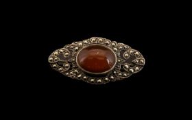 Amber and Marcasite Silver Brooch, large cabochon cut amber set in silver, decorated with