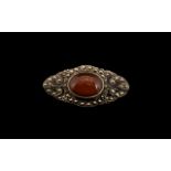 Amber and Marcasite Silver Brooch, large cabochon cut amber set in silver, decorated with