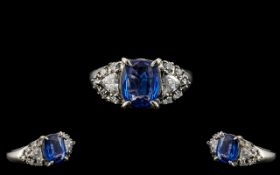 A Contemporary Design Superb Quality Ladies Platinum Sapphire and Diamond Set Ring. Marked 850